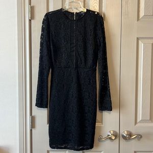Black net dress, size 6. Never worn.